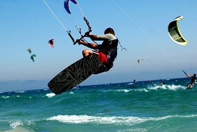 A man kitesurfing