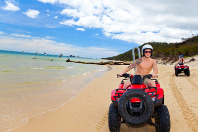 Driving an ATV on a beach